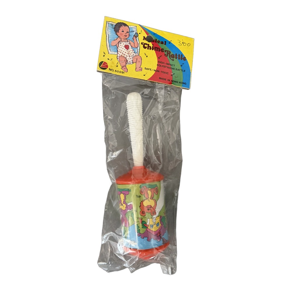 Sonajero musical Chime Rattle en blíster