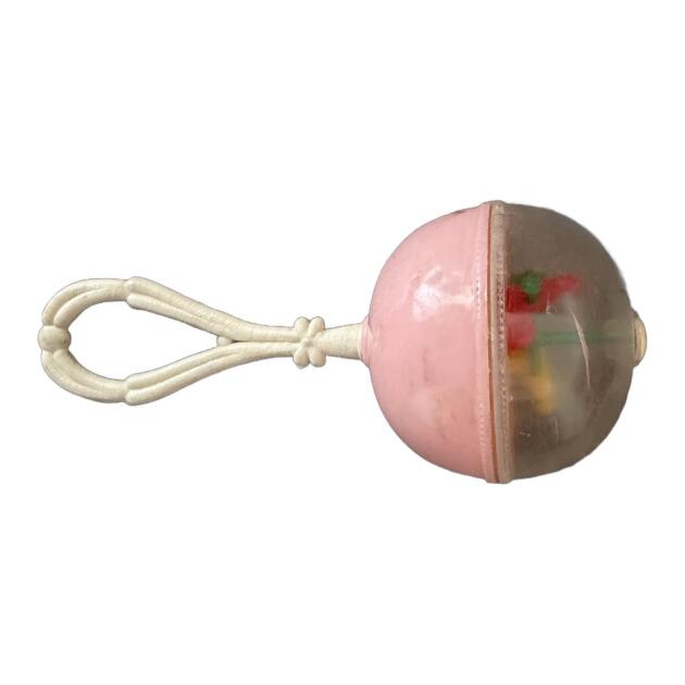 Sonajero bola rosa con mango trenzado