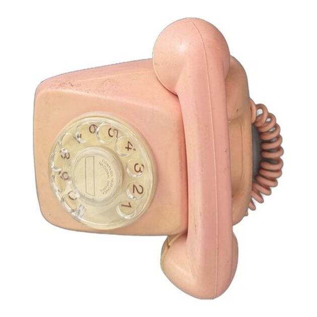 Teléfono de juguete rosa vintage